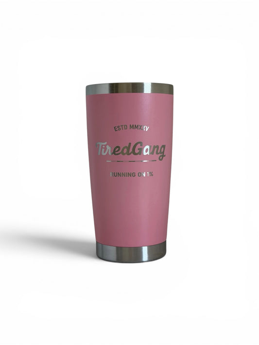 Pink tumbler with silver base and lid on a white background